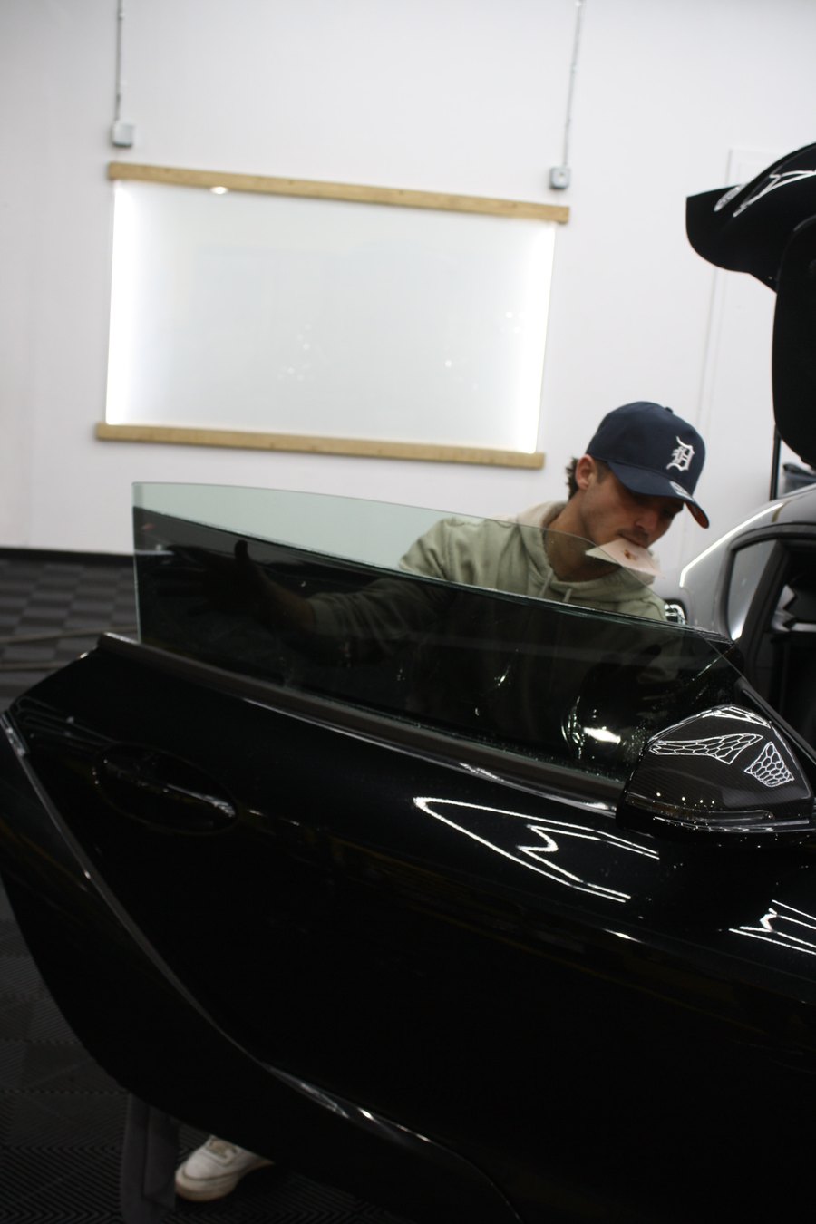 Kane Shackelford installing automotive window film at NextGen Film Co